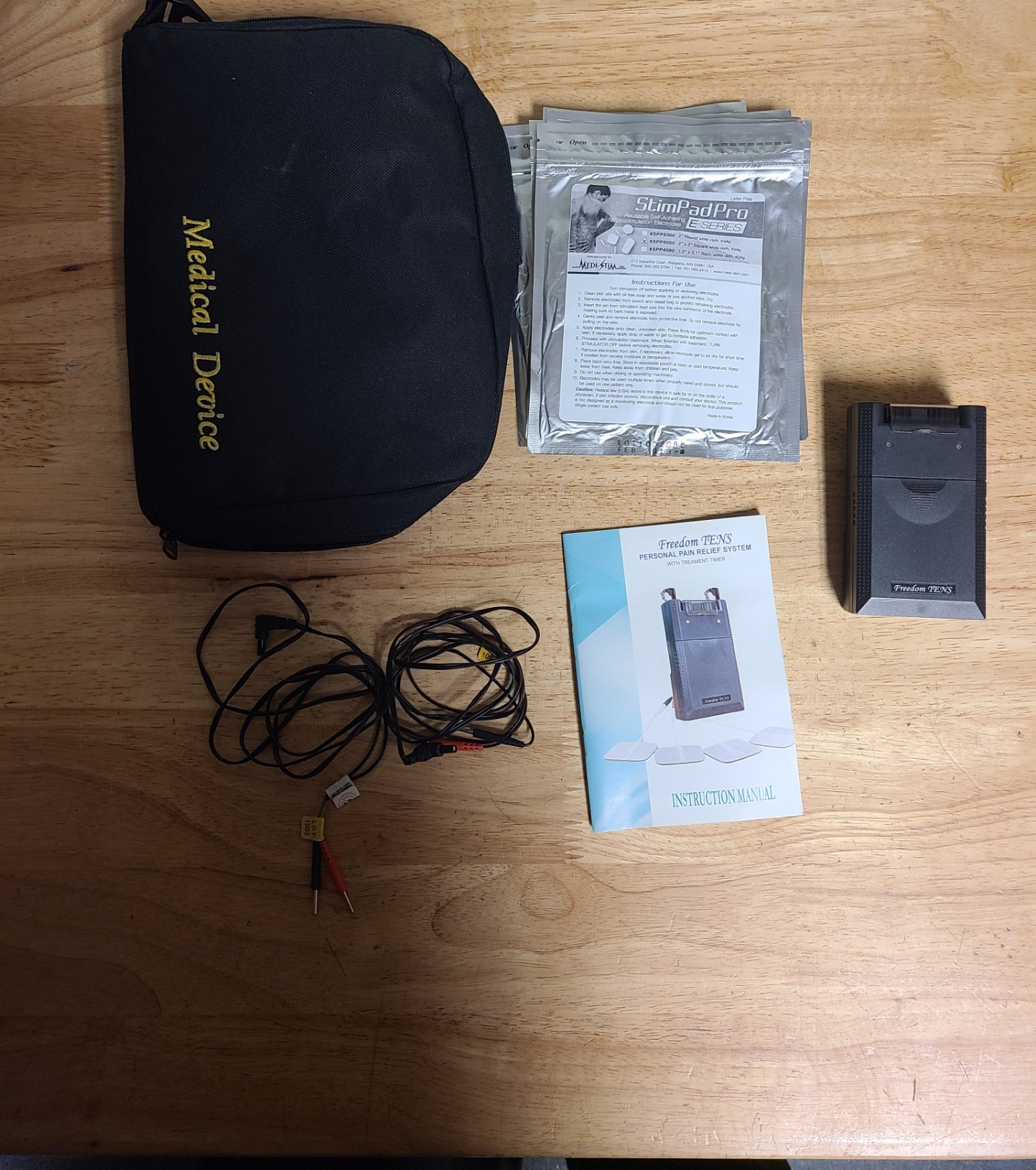 Freedom tens UNIT. BATTERY, LEADWIRES, CASE & ELECTRODES INCLUDED