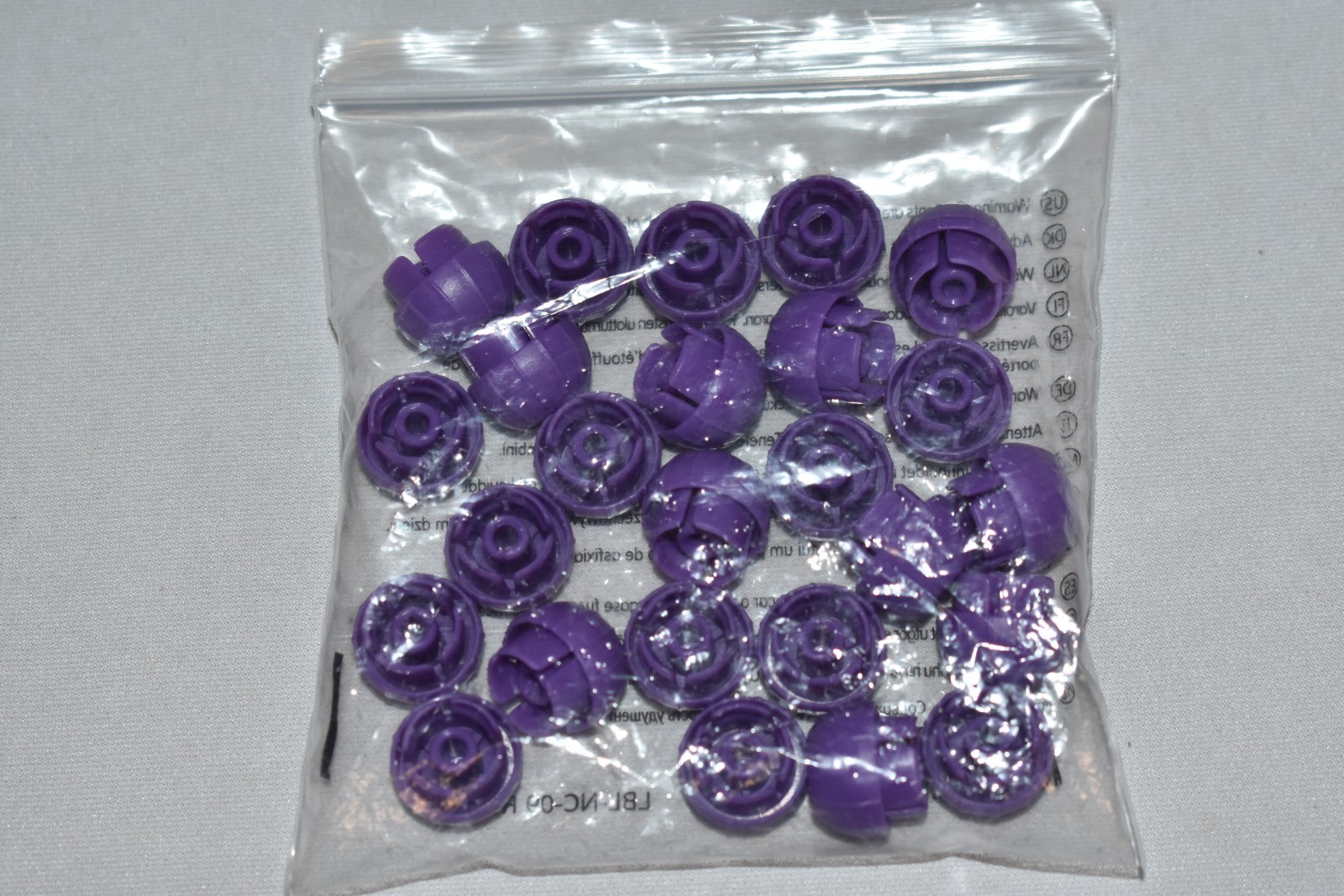 ENFit Neomed Syringe Cap push on qty 25 NEW in bag. Purple.