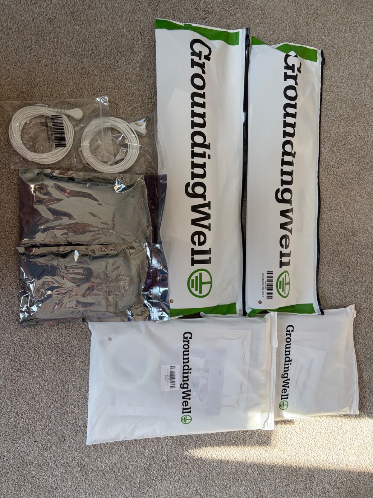 NEW! GroundingWell Bundle-All new in packages. 2 sets: Mat, Sheet, Socks/Cable