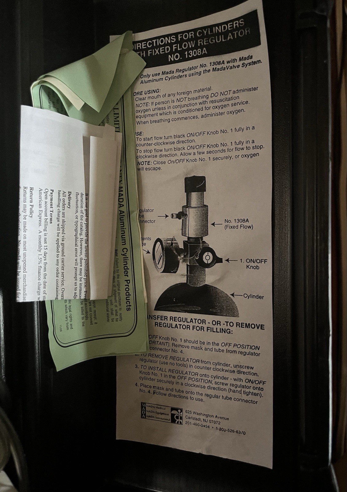 Mada portable emergency oxygen unit, model 1303M housed in a black plastic case.