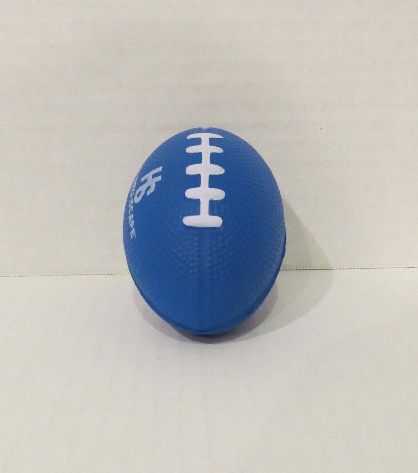 Blue Football Shaped Stress Ball Athlete Coach Novelty